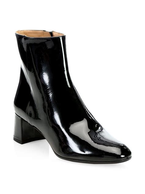 Patent leather ankle boots in black 